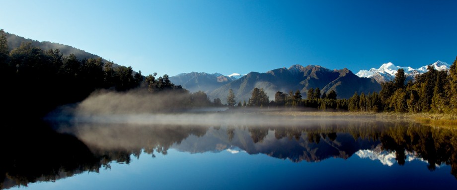 Images of Fox photo gallery shows Lake Matheson with sun and morning mist